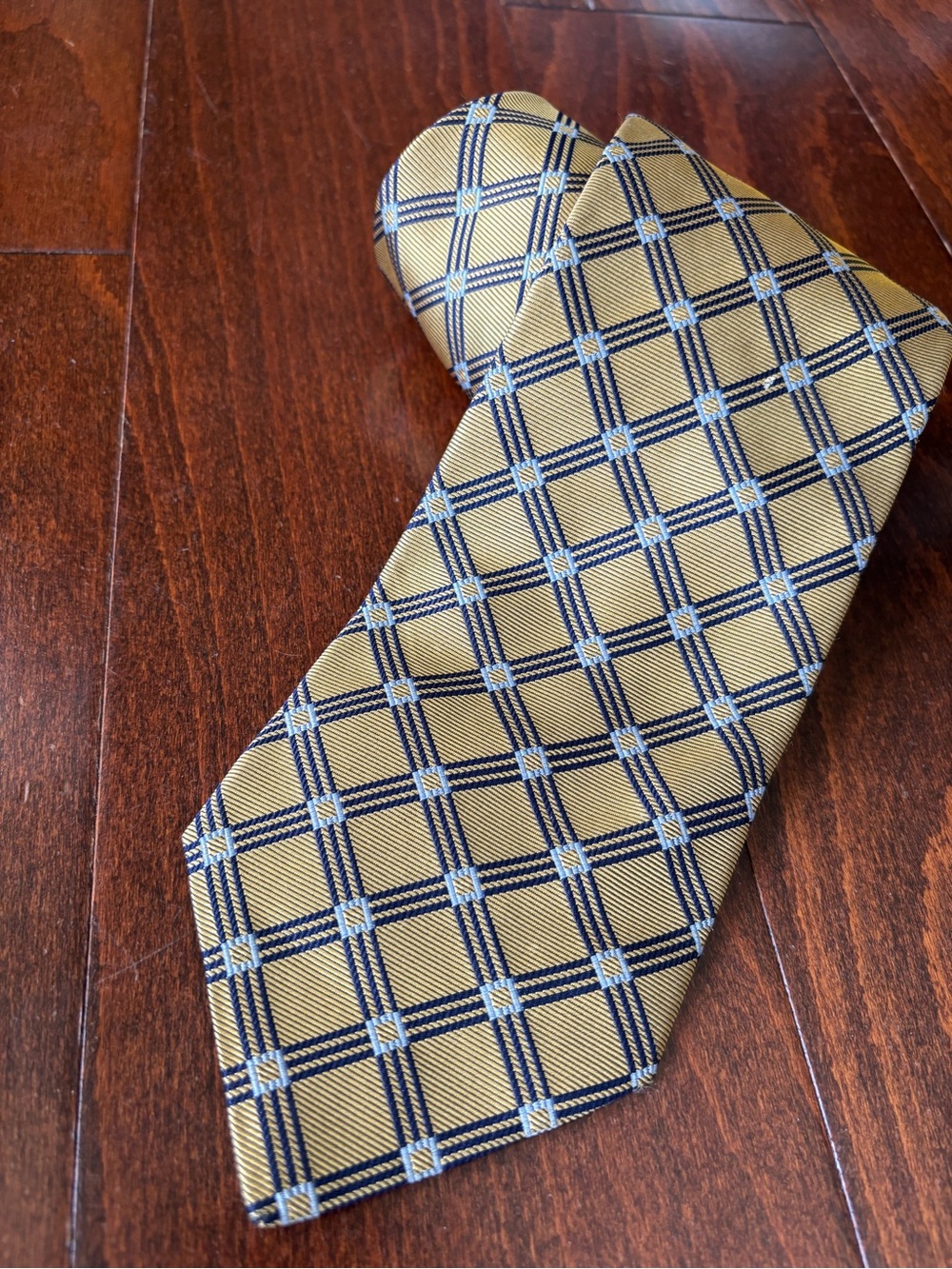 Gold and Navy Plaid Silk Hand Tailored necktie from Hart Schaffner Marx